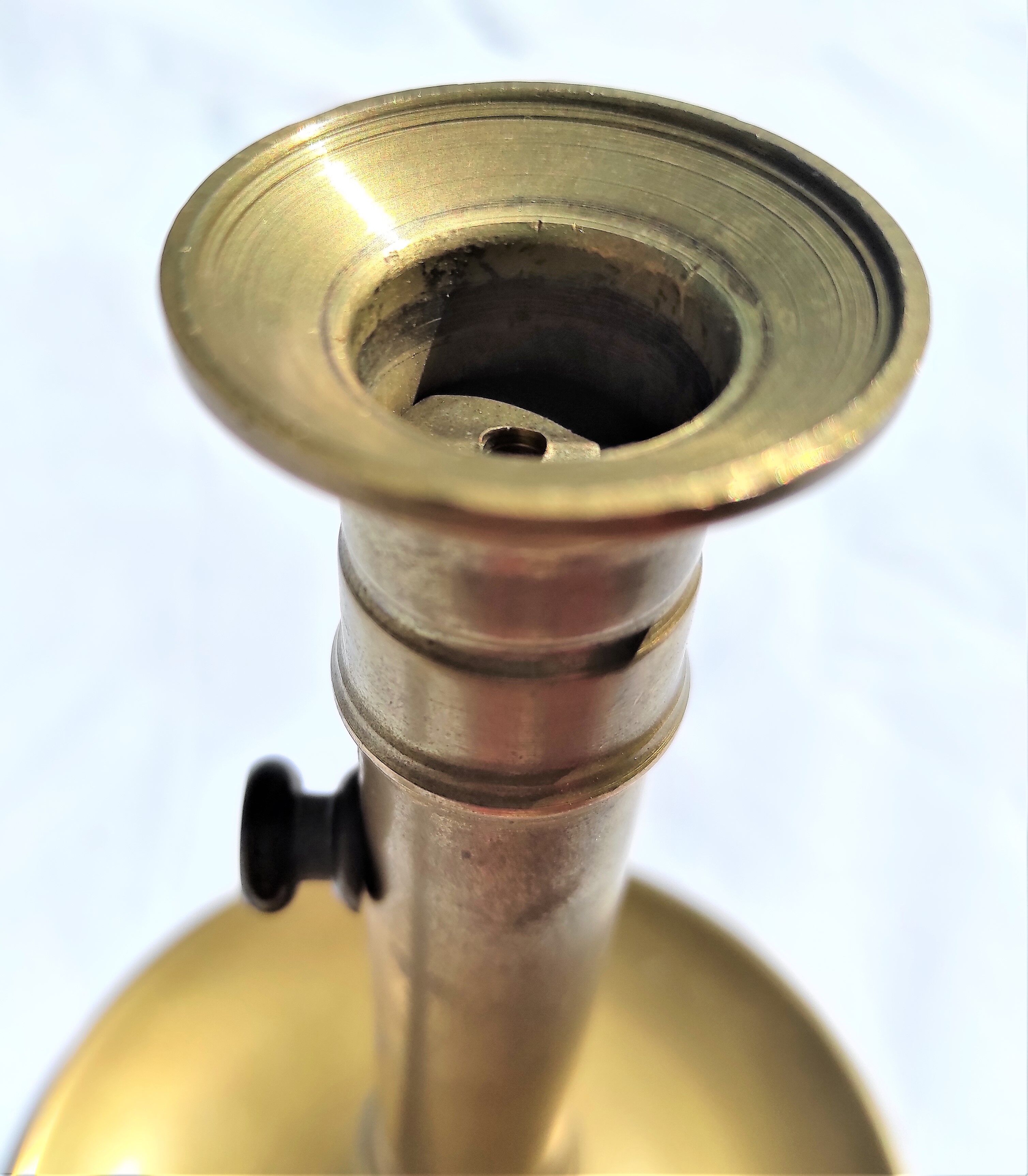 Antique brass candle holder
