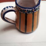 Small milk jug signed AR-H