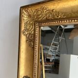 Golden mirror style Restoration decorated with stretched palmettes