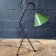 Industrial floor lamp in black lacquered metal and green enamelled sheet metal
