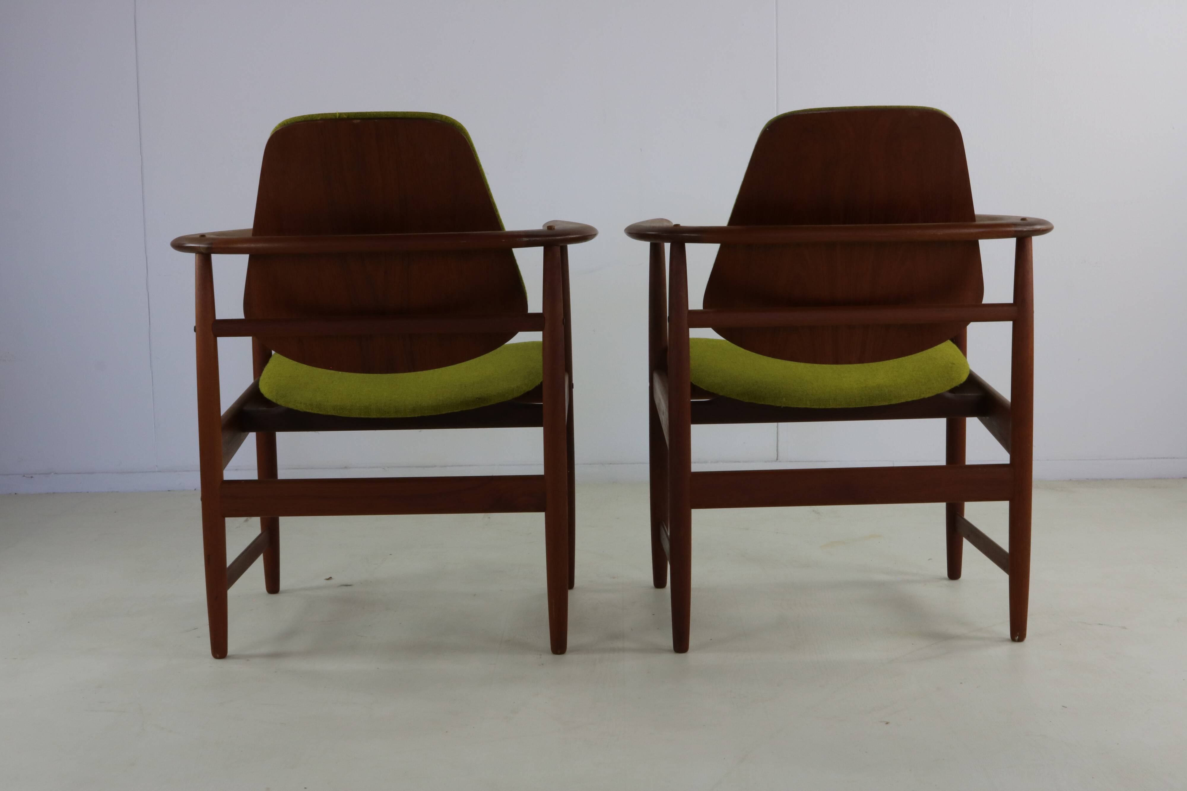 Two Danish design lounge arm chairs by Arne Hovmand Olsen