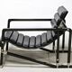 Black leather chaise longue, Eileen Gray design, 1927, France, circa 1975.