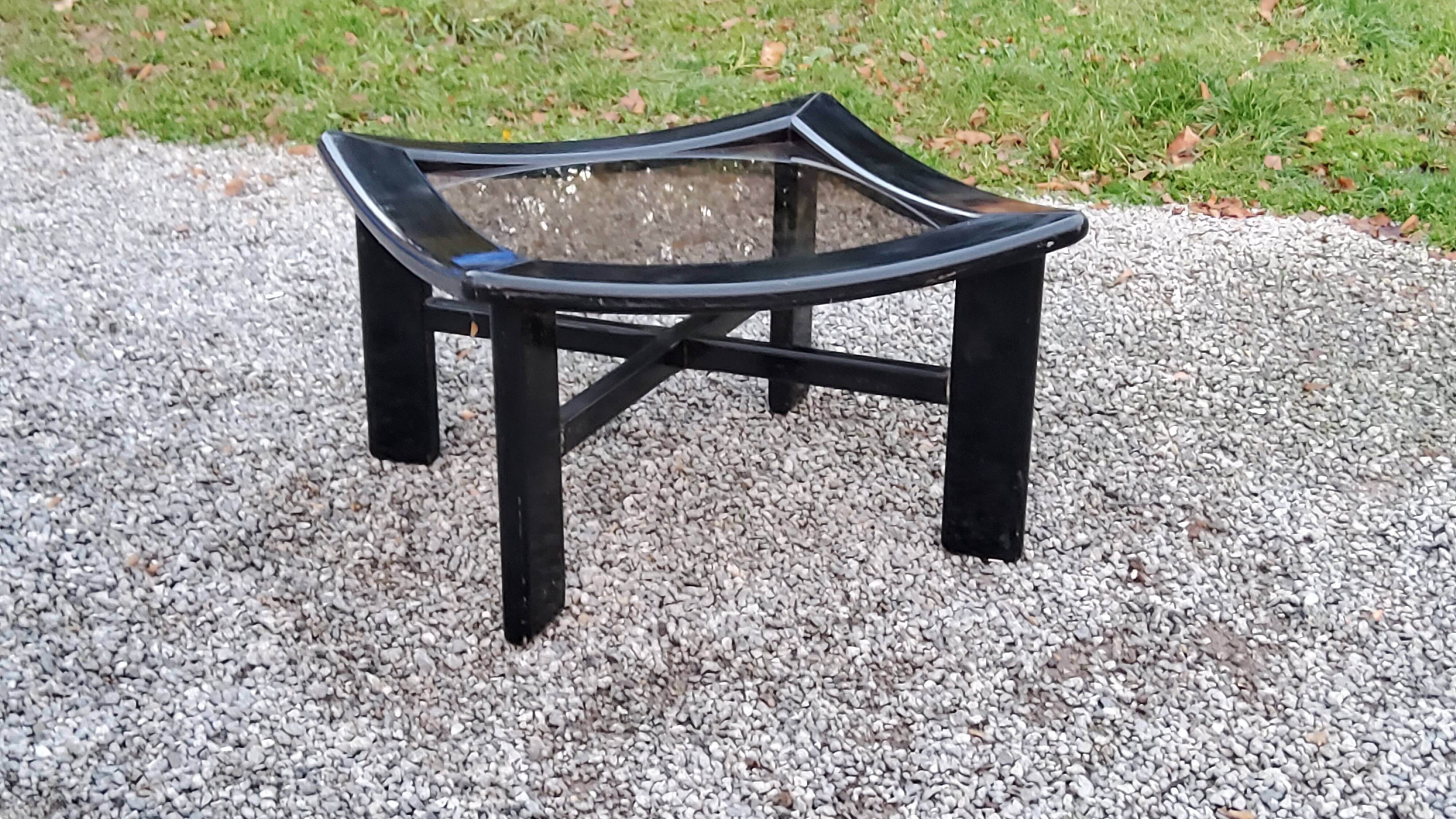 70s design coffee table in black lacquered wood with smoked glass top