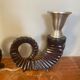 Pair of bronze candlesticks by Chapman