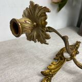Two Louis XV style bronze wall candlesticks