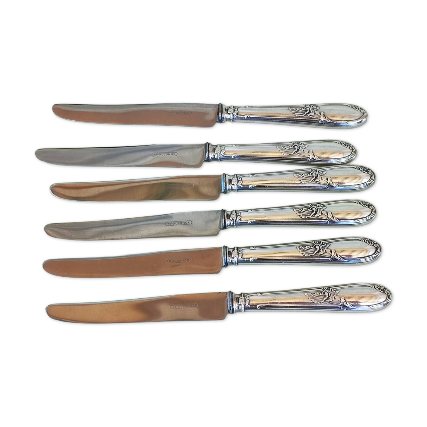 6 couteaux en métal argenté