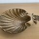 Vintage bronze shell emptier