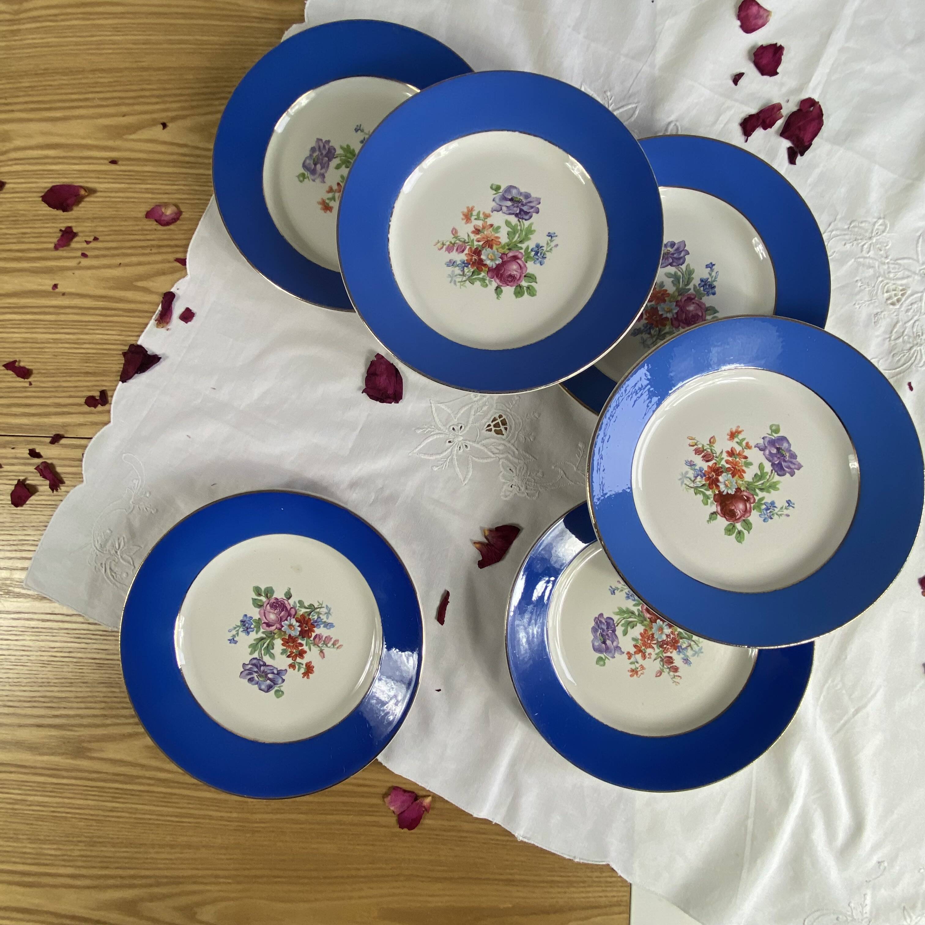 6 blue antique earthenware plates with flowers and gilding from Saint Amand Hamage.