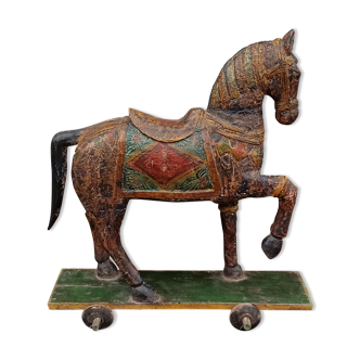 Old horse on wheels