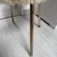 Pair of vintage chairs in beige Dralon® and gold metal.