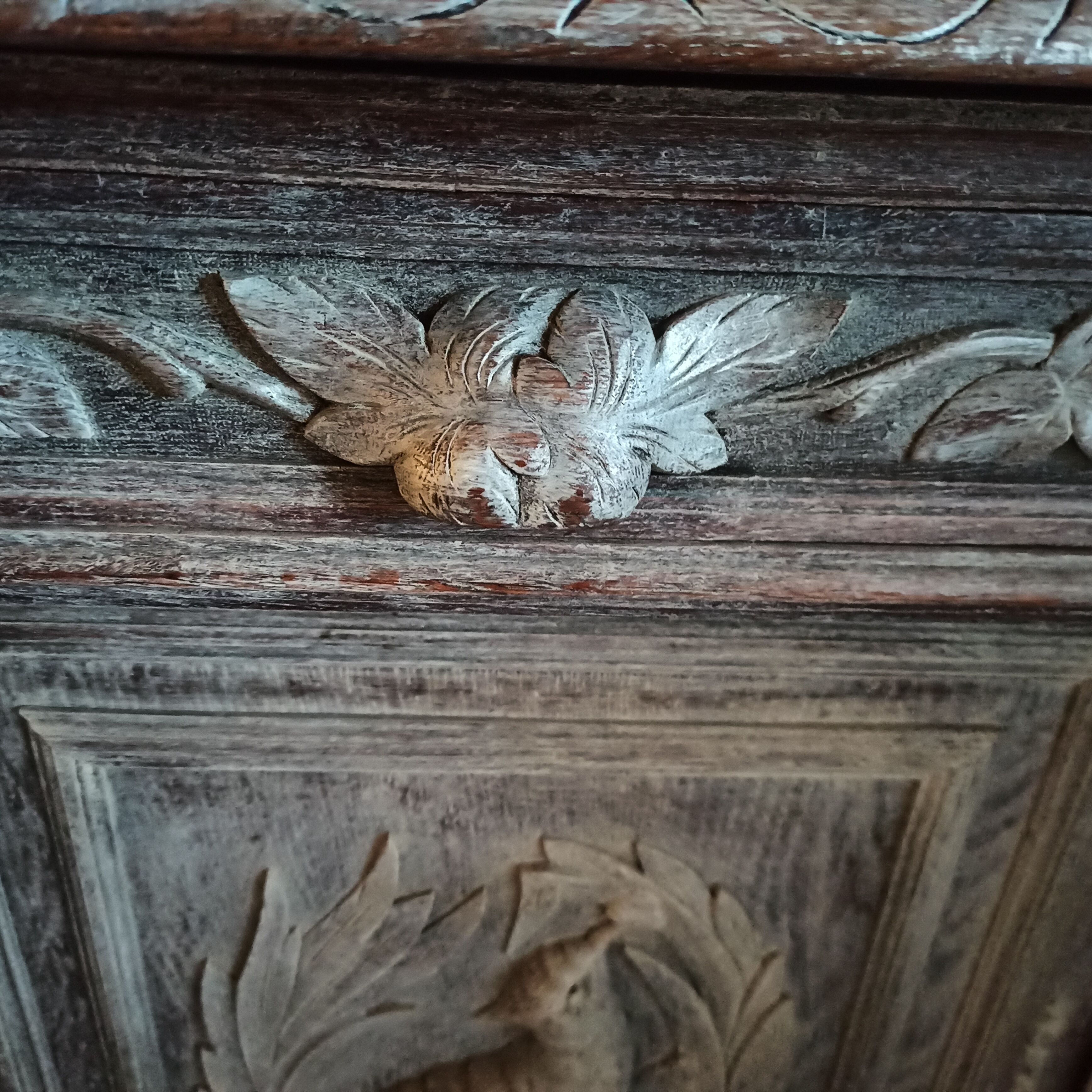 Carved two-body sideboard with 2 lions