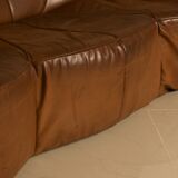 "Pumpkin" 3-seater canapé in patinated brown leather by Pierre Paulin for Arti.