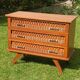 Rattan and wood splayed-leg chest of drawers