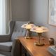 Pair of Art Deco bedside lamps in brass and etched glass