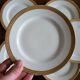 Lot of 8 small porcelain bread plates.