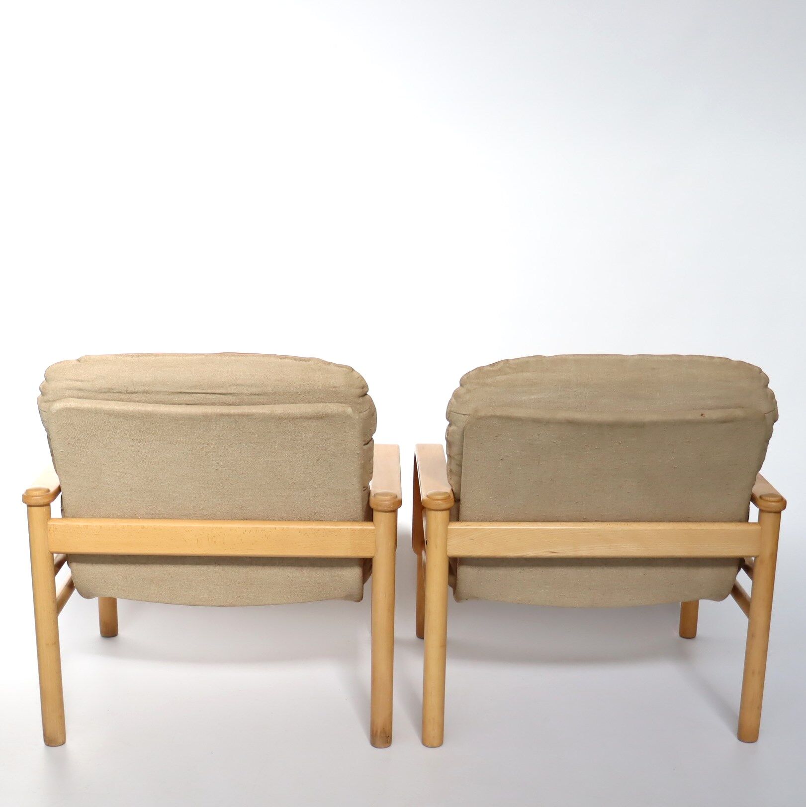 Upholstered leather armchairs 70s