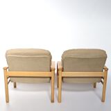 Upholstered leather armchairs 70s