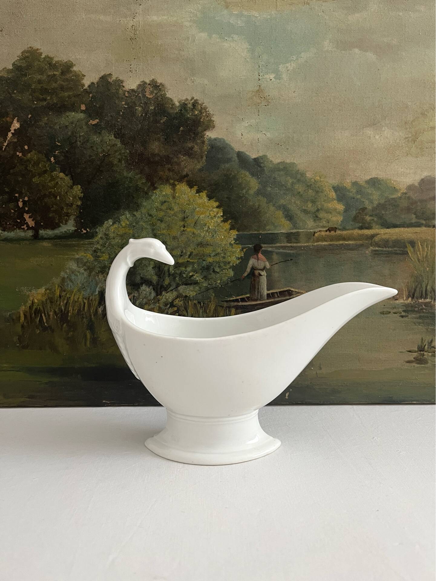 Empire sauce boat with eagle head in antique porcelain