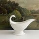 Empire sauce boat with eagle head in antique porcelain