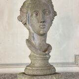 Female bust sculpted in stone