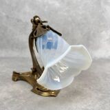 Art Nouveau wall sconces with opalescent iridescent glass