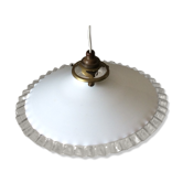 Old suspension in dented opaline