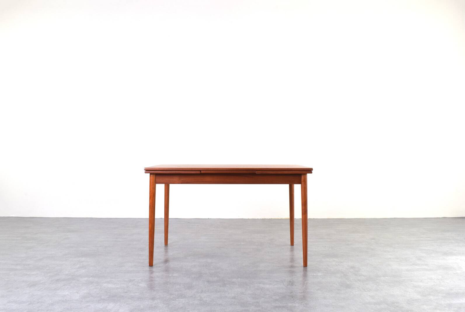 Mid-century Danish teak extendable dining table, 1960s.