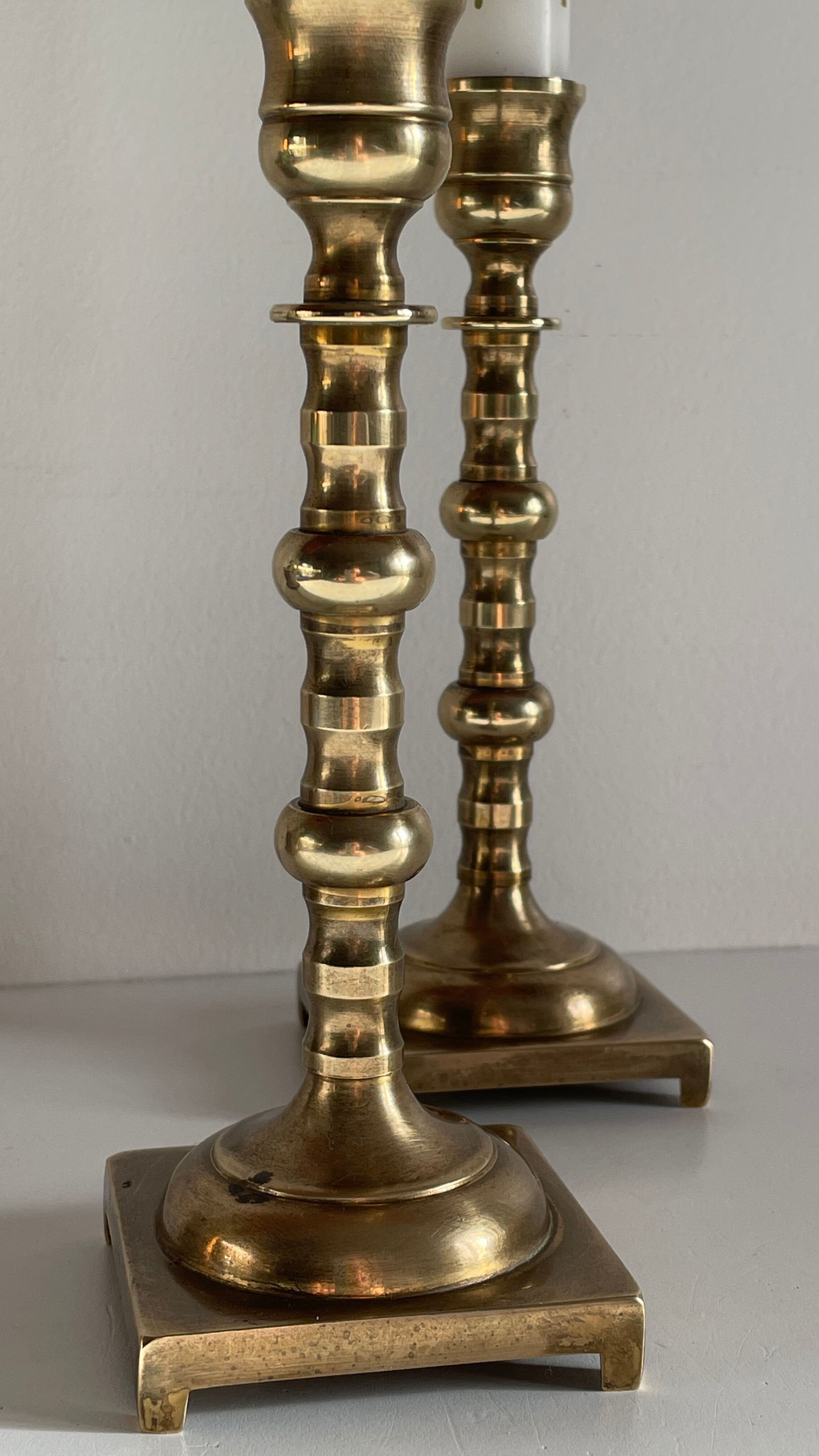 Pair of brass candle holders made in England
