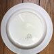 Vintage hollow serving dish with a decoration: marsh landscape.