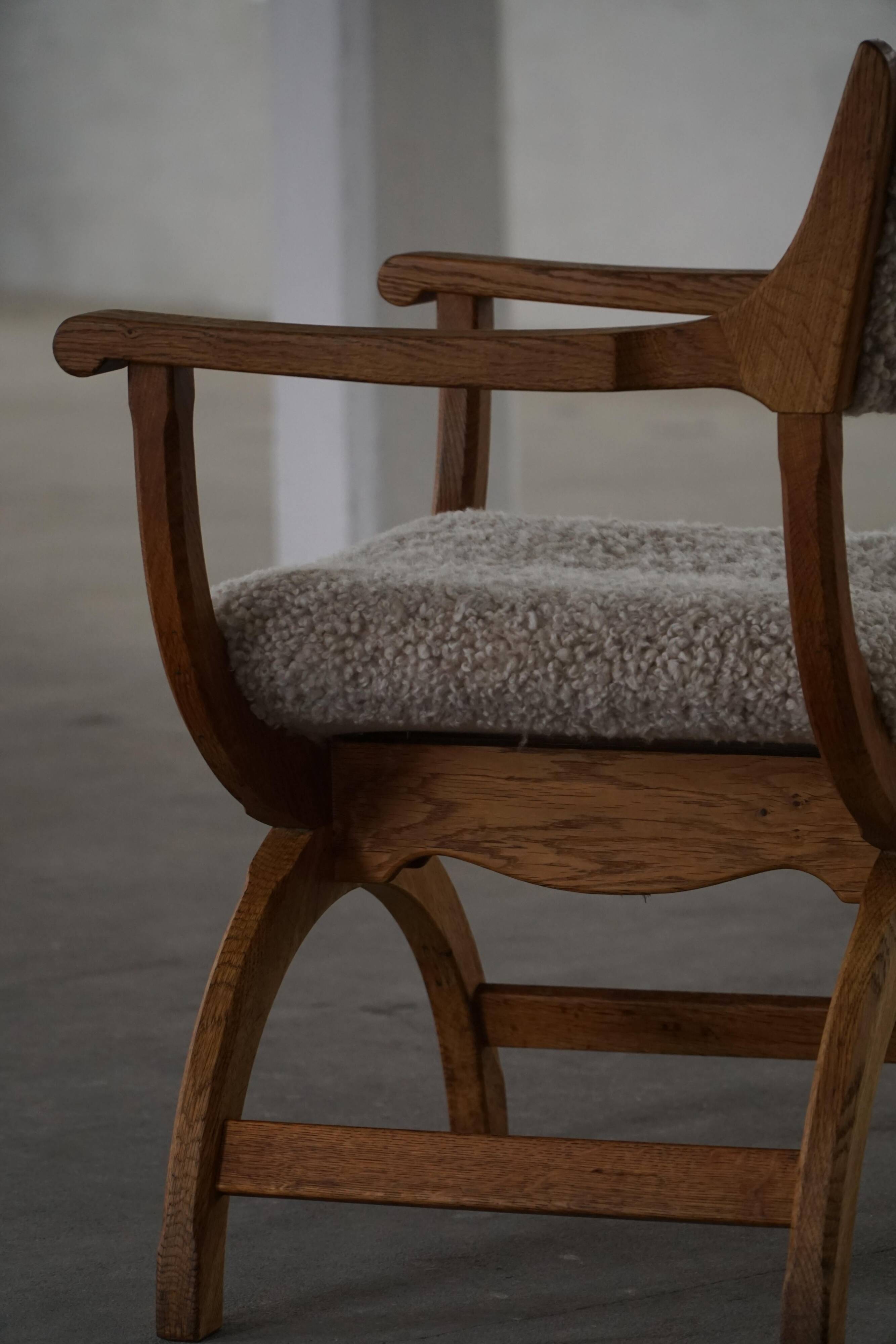 Henning Kjærnulf, Oak and lambswool armchair, "Kurul" model, Mid-century, 1960s