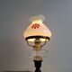 1960s Czechoslovakian milk glass oil lamp style table lamp with red windmill