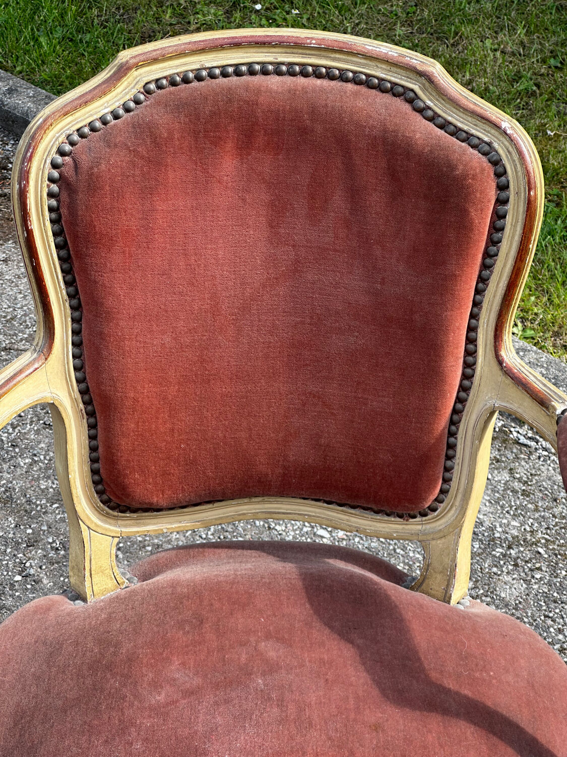 Louis XV cabriolet armchair, patinated wood and antique velvet.