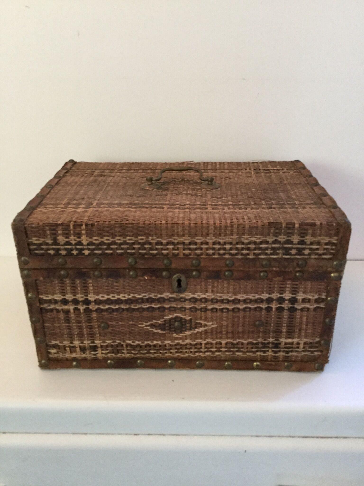 Braided wicker malle