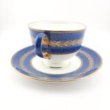 Antique Wedgwood teacup and saucer, bone china. Powder blue and gold English footed cup and saucer,