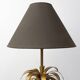 Hollywood Regency brass palm tree table lamp with black shade, France, 1970