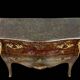 Commode sauteuse galbée en laque à décor Chinois époque début XXeme