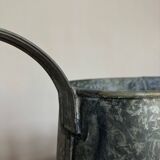 Old garden pitcher vase in folded zinc