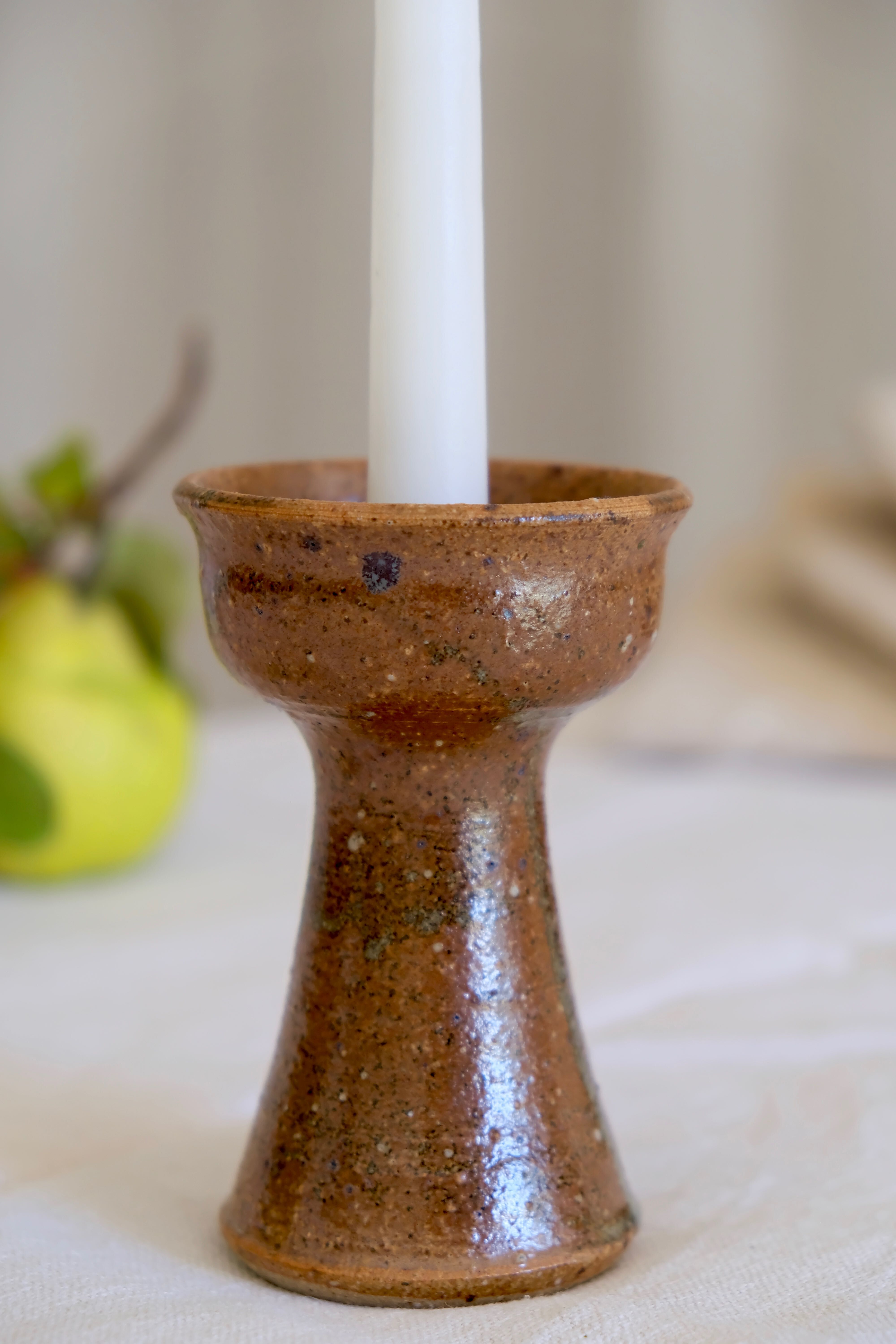 Old sandstone candle holder
