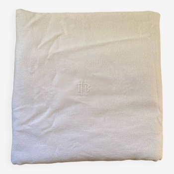 Nappe blanche en fil de coton damassé monogramme HP.