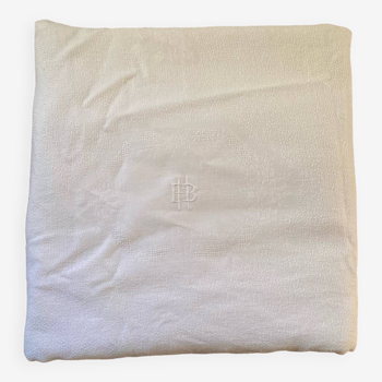 White tablecloth in HP monogram damask cotton thread.