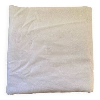 Nappe blanche en fil de coton damassé monogramme HP.