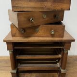 19th century Empire style walnut chest of drawers. It opens with 3 drawers in