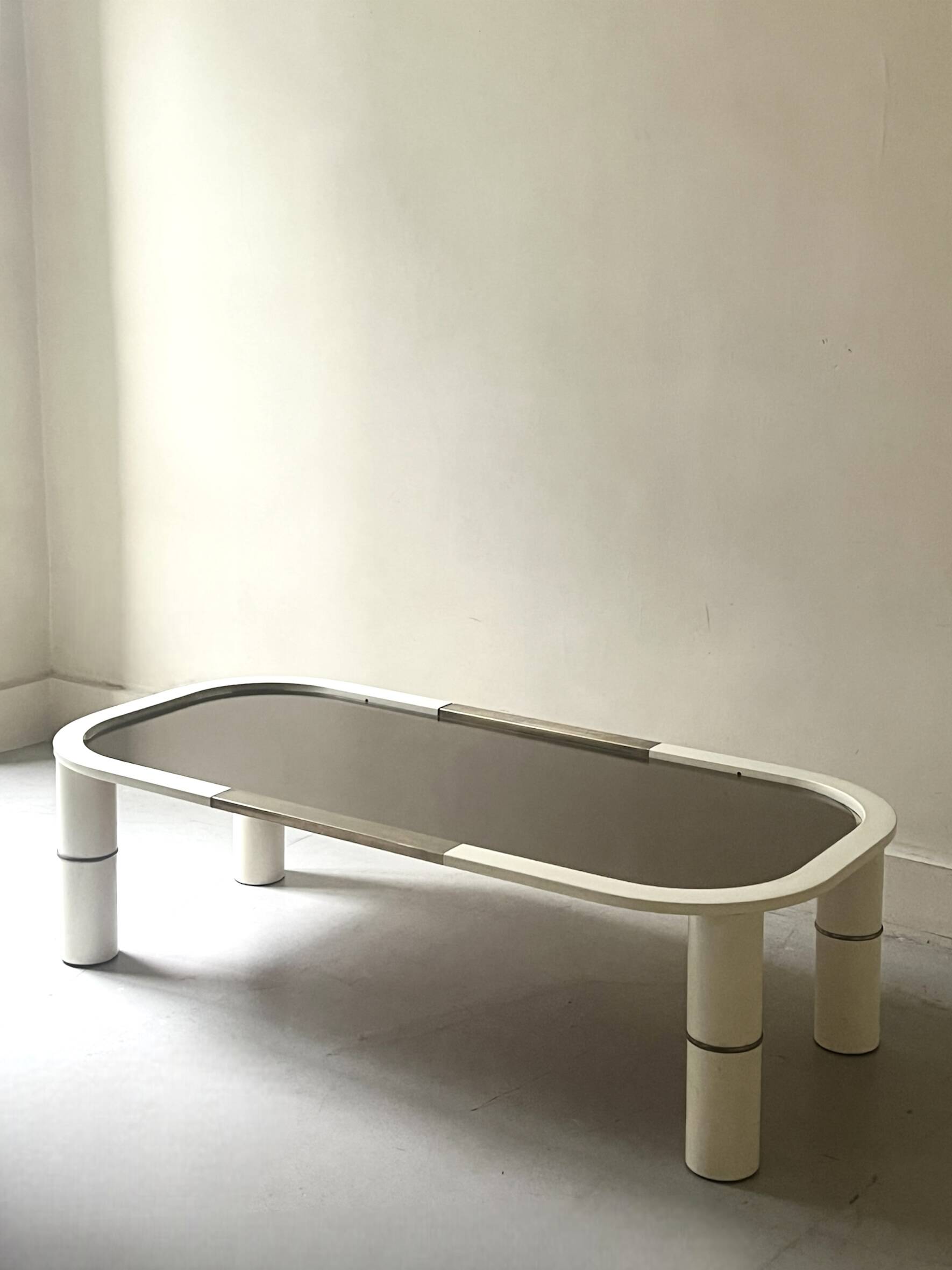 Rectangular coffee table with rounded edges, lacquered metal, brass & smoked mirror, 70s design.