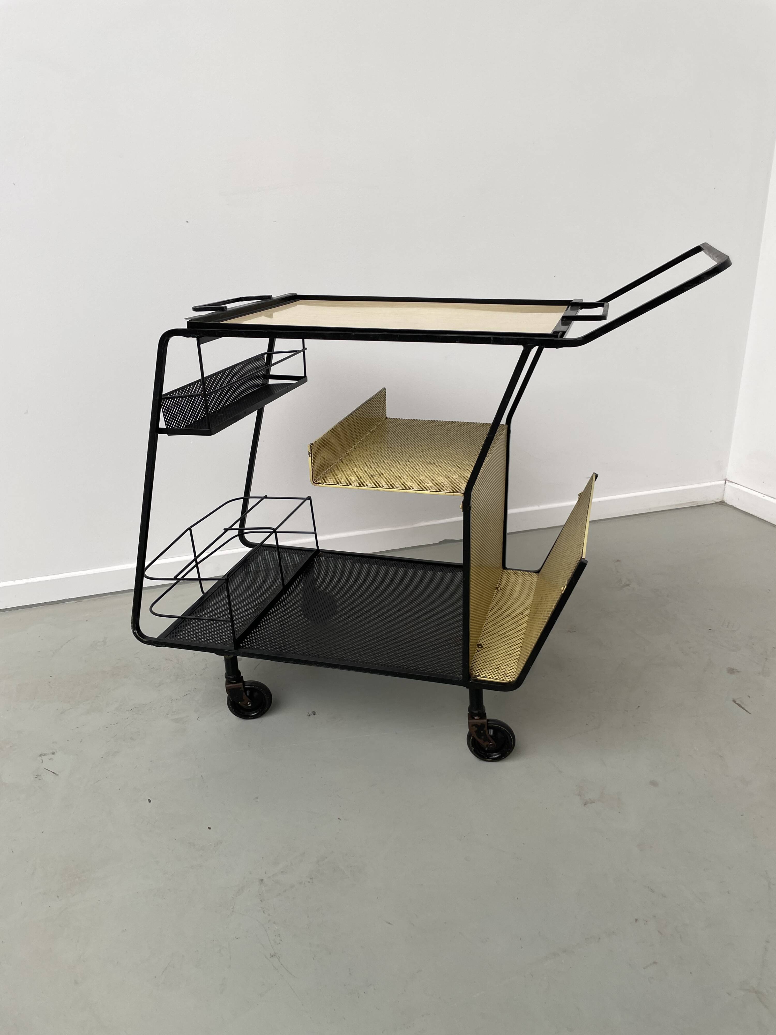 Perforated metal serving trolley in the Mathieu Matégot style