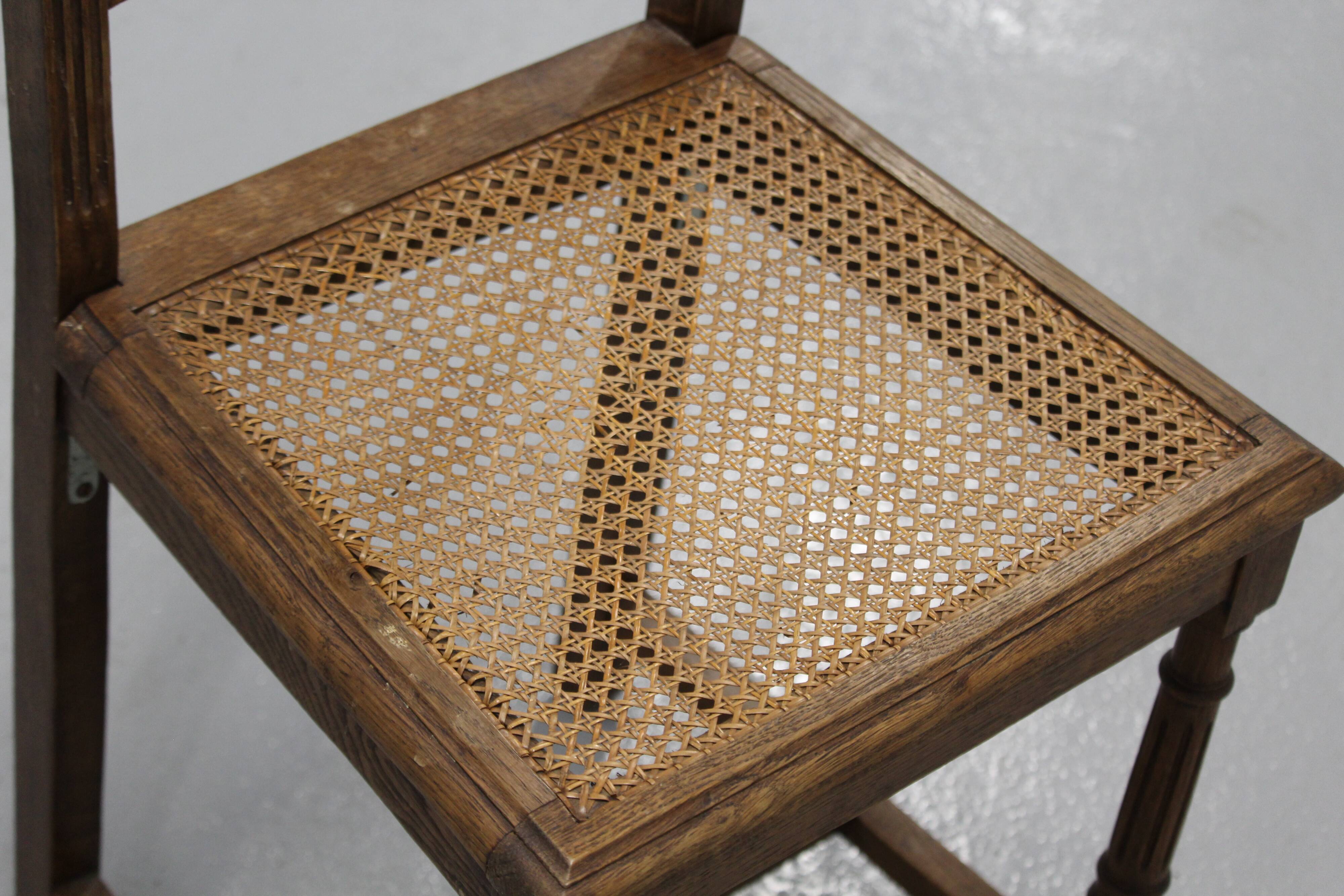 Pair of wooden caned chairs