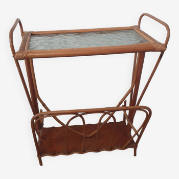 vintage rattan magazine rack with glass top, missing a rim of the magazine rack