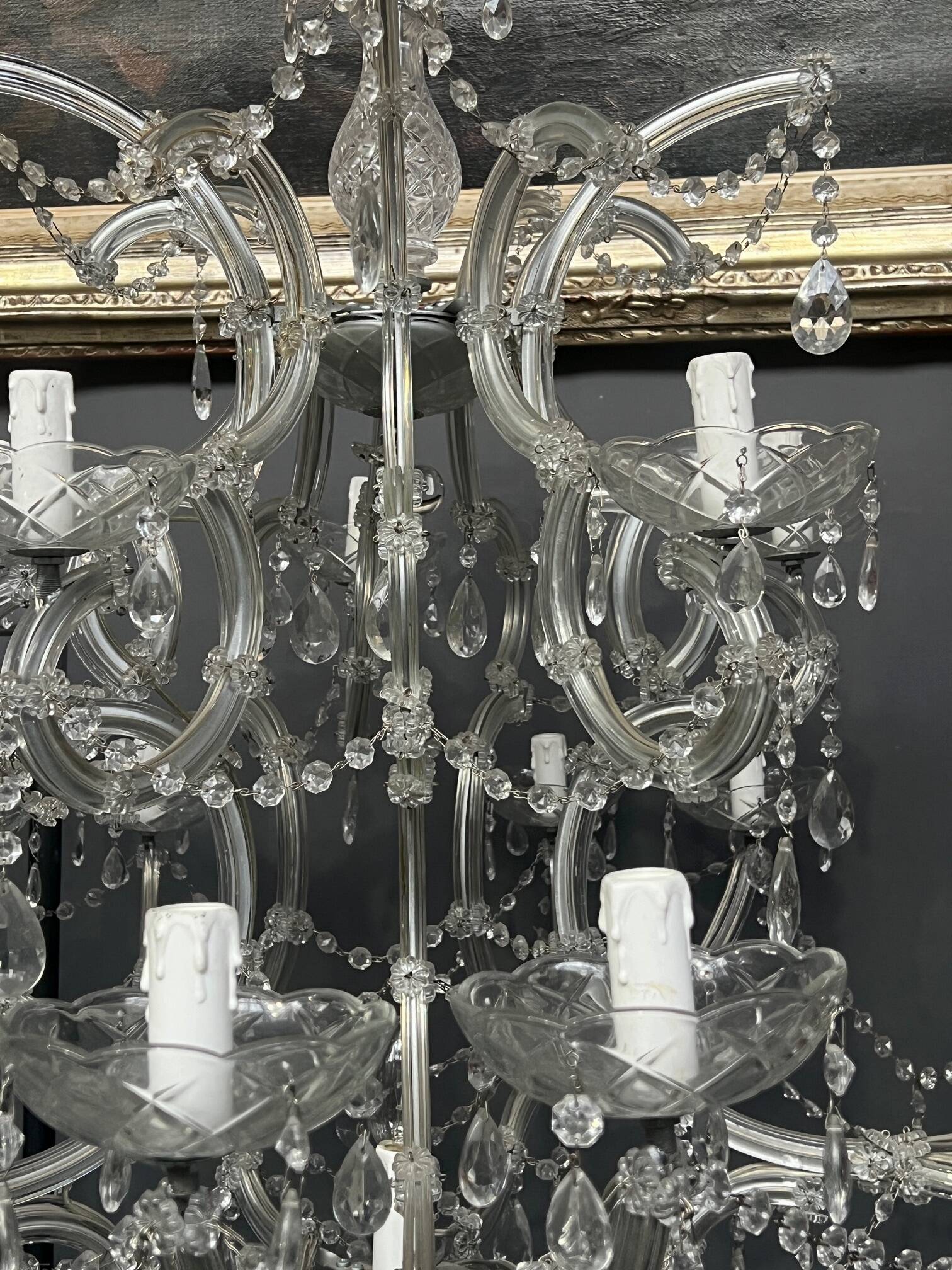 Pair of large Maria Theresa chandeliers. Crystal and glass.