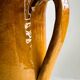 Vintage enameled ceramic watering can vase - retro mustard yellow pot.