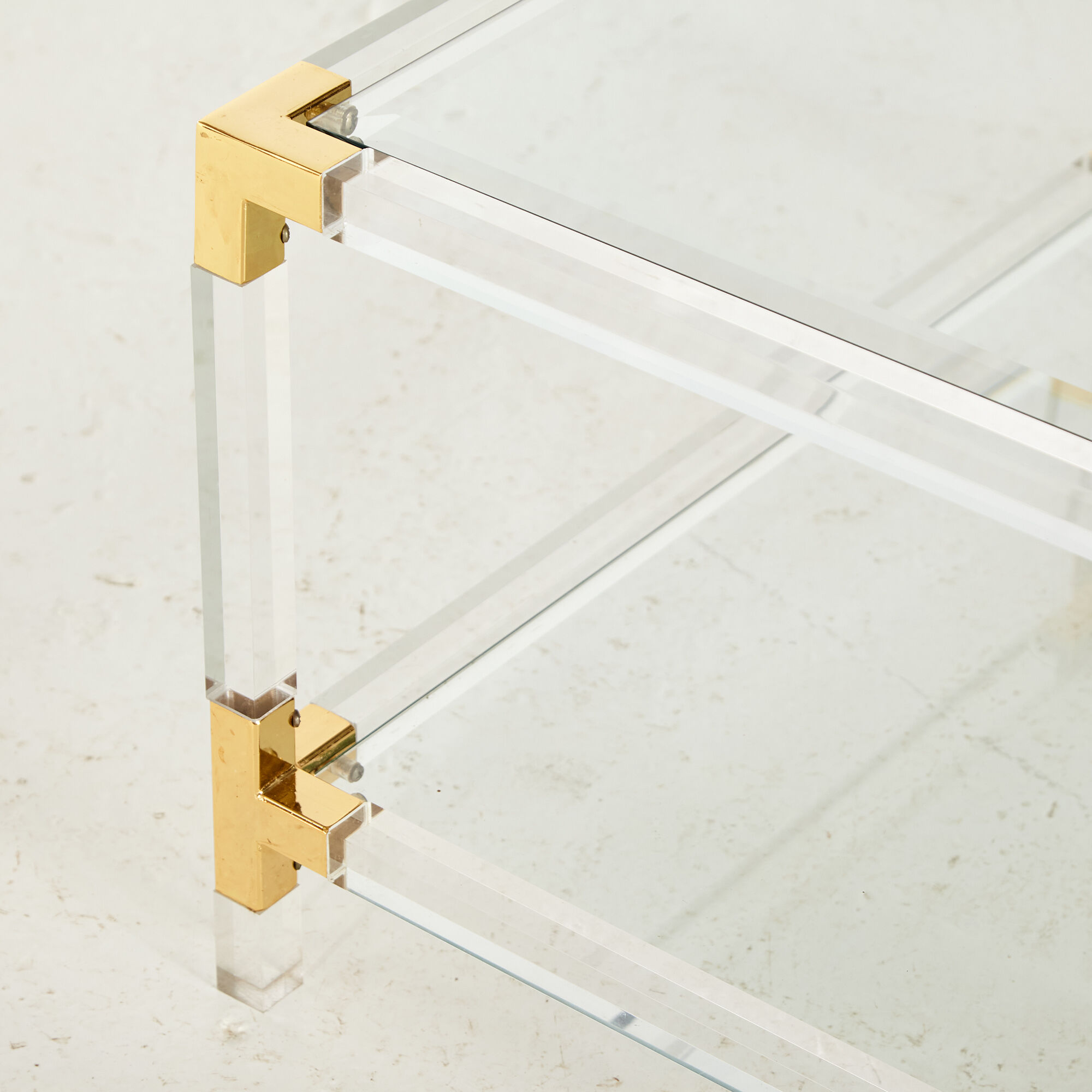 Glass and brass coffee table