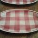 1 oval dish, 1 round dish, 2 raviers, 1 sausage